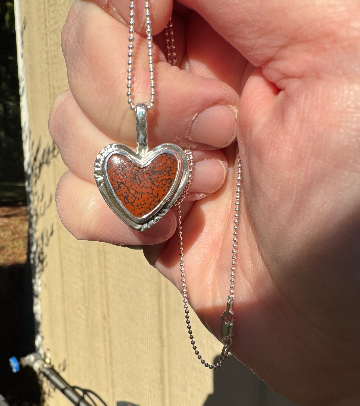 Agatized Dinosaur Bone Heart Pendant